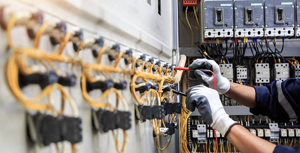 Professional Electrician technician working in Fort Meade, MD